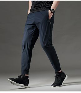 Pantaloni sportivi da allenamento sottili Fit Pantaloni da jogging comodi e asciutti da uomo Pantaloni lunghi da corsa Pantaloni sportivi da palestra Tasca con zip