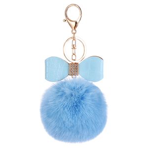Classic Design Fur Puff Key Holder Plush Ball Shape Pom Gold Leather Bow Tie Keychain for Kids Women