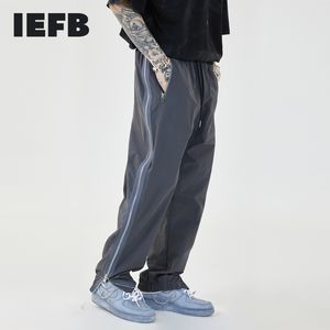IEFB lado zipper perna split workwear calças casuais masculina funcional streetwear moda solta cintura elástica y7467 210524