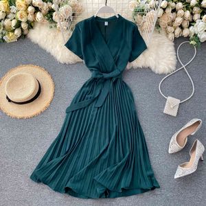 Elegante MIDI Retro Dress Mulheres 2020 Nova Cor Sólida V-Pescoço V-Pescoço Cintura De Lace-Up Slimming Over-the-Knee Plissado Vestido Escritório Senhora X0521