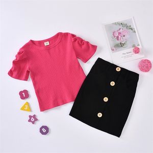 Estate bambini imposta casual manica corta rosa solido t-shirt nera gonna avvolgente carino 2 pezzi vestiti per ragazze 1-6T 210629