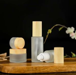 Frosted Glass Face Cream Jar Cosmetic Lotion Spray Bottle with Imitated Wooden Lids Refillable Container 20ml 30ml 40ml 50ml 60ml 80ml 100ml 120ml Packing Bottles