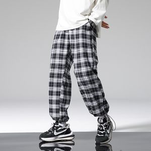 Pantaloni scozzesi autunnali Pantaloni casual hip-hop larghi alla moda da uomo Pantaloni Harem maschili coreani Pantaloni da jogging comodi all-match Streerwear