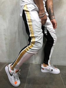 ZOGAA NYA 5 FÄRGOR Fashion Mens Long Sweatpants ColorBlock Hip Hop Fitness Foot Zipper Stitching Byxor Storlek M-XXXL Y0811