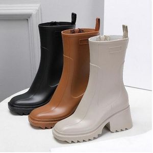 Luxurys designers kvinnor regn stövlar england stil vattentät välgörande gummi vatten regnar skor ankel boot booties 35-39