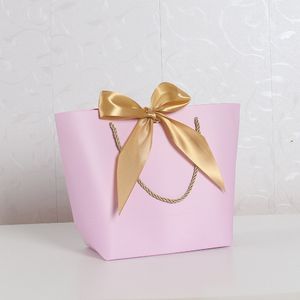 Papperspåsar Party Wedding Gift Wrapping med handtag Shopping Storage Förpackning Kosmetiska Smycken Tote Sack Ribbon Bow