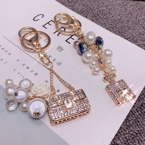 Criativo rhineston frisado frasco frasco keychain fêmea fêmea carro coreano acessórios saco de presente pingente chaveiro para meninas