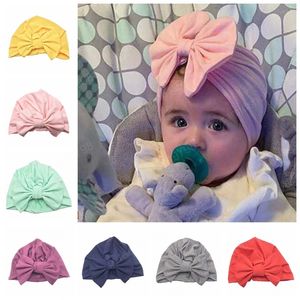 Moda neonato bambino tinta unita bowknot cappelli neonata morbido elastico berretto berretto principessa copricapo accessori puntelli foto