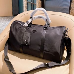 Alabanza y explosión Hombres de calidad superior Moda Duffle Bag Bolsas de viaje de nylon negro Manija para hombre Equipaje Caballero Totes de negocios con correa para el hombro HQP001