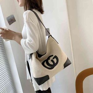Design Large capacity women's and winter new fashion canvas single shoulder bag commuter portable Tote Bag Handbags