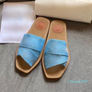 2021 Kvinnor Tofflor Woody Muller Skor Designer Canvas Cross Woven Sandaler Sommar Utomhus Öppet Toe Casual Slipper Letter Stylist Shoe 2021