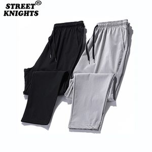 Casual byxor män joggare sweatpants solid färg elastisk midja byxor fitness sportkläder mode sommar vår sweatpants 211013