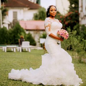 Luxury Pearls Beaded Mermaid Wedding Dresses Cascading Ruffles Skirt Long Train African Bridal Gowns Jewel Neck Appliques Lace Half Sleeve Bride Dress Vestido