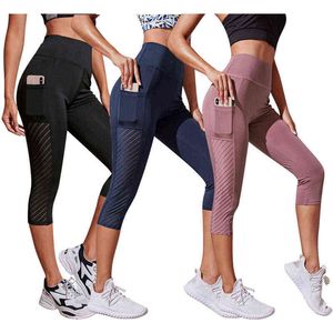 Обрезанные брюки йоги Женщины для похудения Фитнес-шорты бегущие леггинсы Бедро, подъемные с карманными спортивными брюками Высокая талия плотно легание H1221