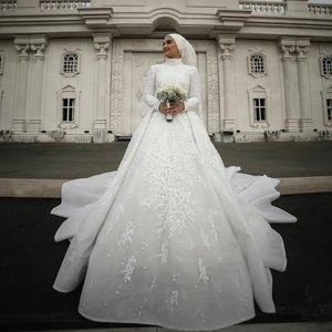 Muzułmańskie frezowanie linii ślubnej sukienki wysokiej szyi z długim rękawem koronki 3D kwiatowy aplikacje suknie ślubne cekiny panna młoda suknia