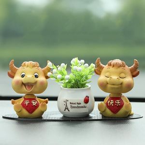 Wholesale universal design homes for sale - Group buy Cute Cattle Design Resin Model Doll Swinging Ornament Home Car Decor Display Mold Universal Styling Accessories Interior Decorations