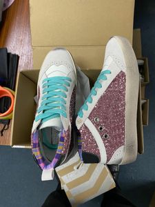 Scarpe firmate con sneaker dorate di sneaker golden mid stella casual sneakers italia metallico in agguato in pelle in pelle in pelle in pelle in pelle in pelle in pelle in pelle in pelle in pelle snaker di cuoio 974