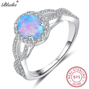 Anelli a grappolo Blaike Retro Oval Blue Fire Opal Anello incrociato 100% vero argento sterling 925 cristallo bianco ottobre Birthstone per le donne