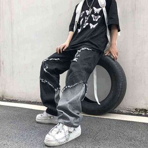 Koreanska nya mode tofs contrast jeans trendig cool high street hajuku stil lös rå kant jeans män trendiga g0104