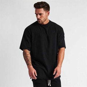 Odzież siłownia Fitness Męskie Oversized T Shirt Mężczyźni Hip Hop Sportswear Loose Half Sleeve T-shirt mięśni Mężczyzna Kulturystyka Tshirt 210629