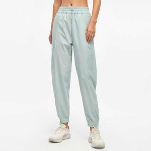 Lösa Casual Sports Pants Kvinnors Leggings Yoga Outfits Slim Löpande Dans Snabbtorkande Yoga Byxor Tunn Andas Fitness Kläder