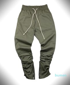 2021 -Khaki / Svart / Grön Koreansk Hip Hop Fashion Pants med Zippers Factory Connection Mens Urban Clothing Joggers Byxor