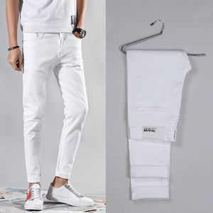 Män sträcker skinny jeans mode casual slim fit denim byxor blå svart vit himmel blå byxor manliga varumärke kläder