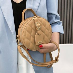 Borse da sera Piccola borsa da torta rotonda in pelle Ling Ge Pu Borse da spalla moda donna 2021 Borsa da viaggio femminile Messenger