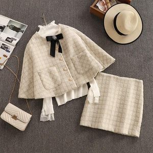 La tuta è alta tweed e fiocco decorato cappotto di mantello + gonna in due pezzi 1125 tuta da donna