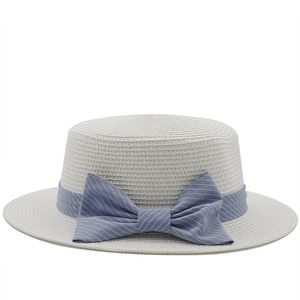 Berretto da spiaggia estivo da donna bowknot berretti di paglia di erba cappelli da donna a tesa piatta madre e figlia cappello da sole ragazze signore moda cappelli da viaggio cappelli da sole 2022 all'ingrosso