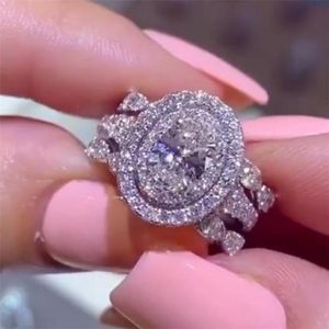 Alianças de casamento mais vendidas em 2021 Jóias Lxuury Prata esterlina 925 Preenchimento Corte oval Branco 5A Zircão cúbico CZ Diamante Pedras preciosas de festa para mulheres Banda de noivado Anel presente