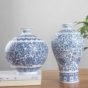 艶をかけられた青と白の磁器のインターロック蓮のデザインセラミック花瓶の家の装飾Jingdezhen花の花瓶