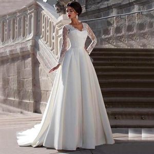 Abiti da sposa in raso a trapezio con applicazioni di pizzo modesto Abiti da sposa Scollo a V Sheer Back Manica lunga Taglie forti Per le donne Principessa Bianco Avorio Robe de Mariee