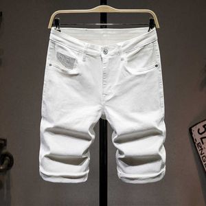 brand summer men's denim shorts solid color simple and fashionable English elastic slim straight five-point pants 210531