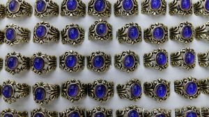 Högkvalitativa humörringar Europa Mode Vintage Pierced Flower Change Färg Ring Mix Size