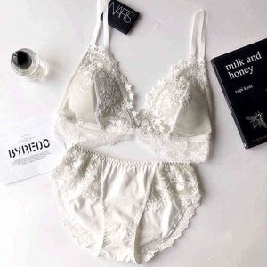 Nxy conjunto sexy pequeno copo de algodão íntimo para meninas bordados fino brassiere com pad mulheres sexy laço underwear lingerie fio menos sutiã conjunto 1202