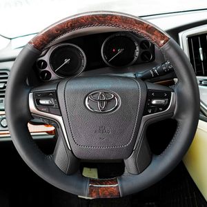 Suitable for Toyota Crown Land Cruiser Landkuluze Overbearing Prado Peach Wood Grain Hand Sewn Leather Steering Wheel Cover