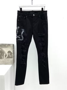 Jeans da uomo Pantaloni a matita firmati a forma di serpente Stampati Pantaloni in denim a gamba sottile neri Abbigliamento da club alla moda per pantaloni skinny hip-hop maschili