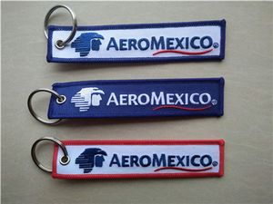 aeroメキシコの航空会社のAeromexicoの生地刺繍キーチェーンMerrowの境界線で作られたカスタム13x2.8cm 100pcsロット