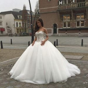 2020 New Saudi Arabic A-line Basque Waist Wedding Dresses Sweetheart Beaded Crystals Backless Elegant Bridal Gowns with Spaghetti Straps 361