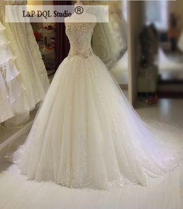 아이보리 볼 가운 웨딩 드레스 Applique Crystal Plus Cide Bridal Gowns Court Train이 장착 된 Tulle Organza