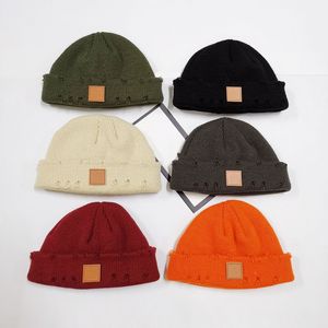 Klassiska män designer vinter beanie mode färg lyx stickad hatt kvinnor par casual utomhus kalla hattar