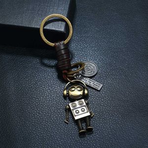 2021 Nyaste mode punk handvävda läder nyckelring väska smycken legering robot retro cowhide keychain kreativ liten gåva charm g1019