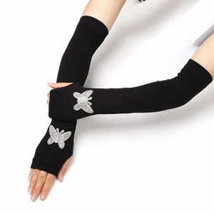 Guanti da guida caldi lavorati a maglia lunghi con fiocco nero femminile con fiocco mezzo dito Guanti punk con strass da ballo con elasticità a cuore carino femminile