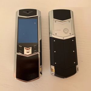 Ny anländer signatur hög klassisk lyx v8 glida telefon gyllene stål gravitation sensor safir glas metall kropp mp3 bluetooth upplåsta dubbla sim kort moblie mobiltelefoner