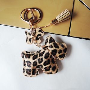 2020 Leopard PU Läder Dog Tassel Nyckelring på väska Trinket Mode Guld Charm Bil Keychain Smycken Kvinnor Väska Tillbehör Present