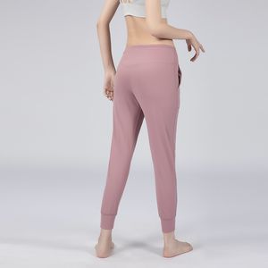 Gratis frakt lycra tyg naken känsla lyacal tyg hög midja yoga kvinnor som kör gym fitness tights elastiska leggings med två sidofickor svettbyxor