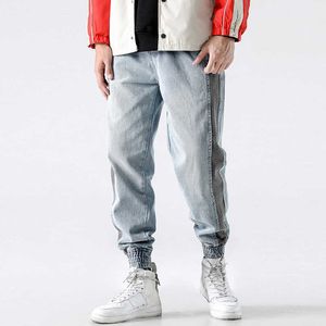 Streetwear Fashion Jeans Uomo Spliced Designer Casual Denim Cargo Pants Stripe Patchwork Pantaloni Hip Hop Pantaloni Harem WFQR
