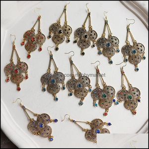 Dangle ljuskrona örhängen smycken indisk jhumka guld metall ihålig blomma formad retro överdrivna etniska långa bohemiska kvinnor bröllop droppe