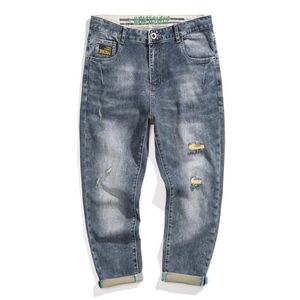 Jeans da uomo Pantaloni Harem da uomo strappati Pantaloni corti Pantaloni Capri-Pantaloni hip-hop strappati elasticizzati blu Abbigliamento invecchiato 2021 Estate